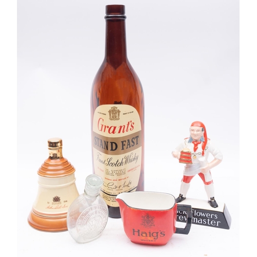 19 - A Carltonware advertising figure 'Pick Flowers Brewmaster', together with a 'Haig's Whisky ' water j... 