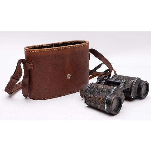 190 - A pair of Carl Zeiss Jena Deltrintem 8 x 30 binoculars, serial number 1254096, in remains of origina... 