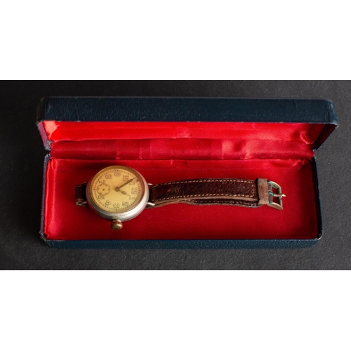 209 - A WWI period wristwatch, unsigned, the dial with Arabic numerals and luminous hands in a steel case,... 