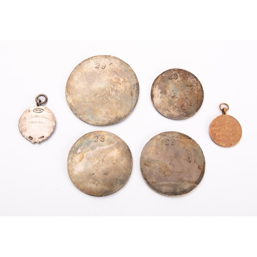 22 - A group of four circular intaglio seals, together with a 9ct gold fob and a silver and enamel 'Exete... 