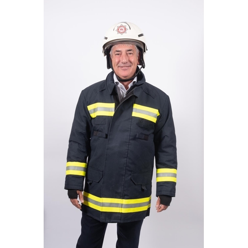 222 - A collection of various fire fighting  uniform, comprising two Cromwell F600 helmets, a blue wool tu... 