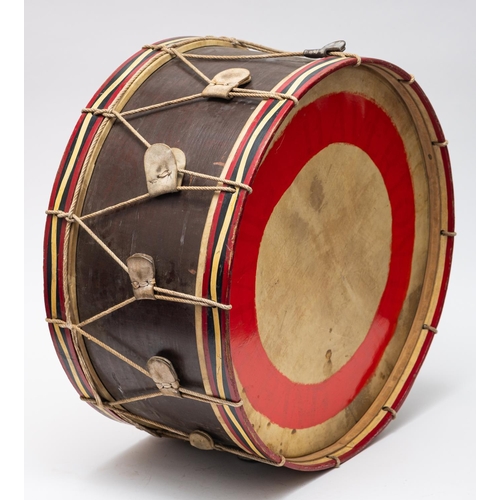 233 - An early 20th Century military wood body bass drum complete with cord suspension ropes and tension s... 