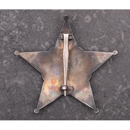 242 - A WWI Turkish Star of Gallipoli, German made red enamel on white metal with four rivet back and  pin... 