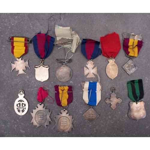 244 - A group of eleven Army Temperance Association medals, together with a Total Abstinence Medal (12)