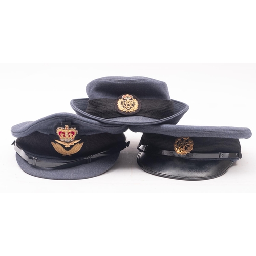 251 - Two RAF peaked caps and a Wren's hat. (3)