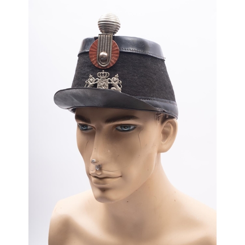 254 - A Dutch non-commissioned Officers Schutterij Shako M1865 pattern, with ball pommel over pressed helm... 