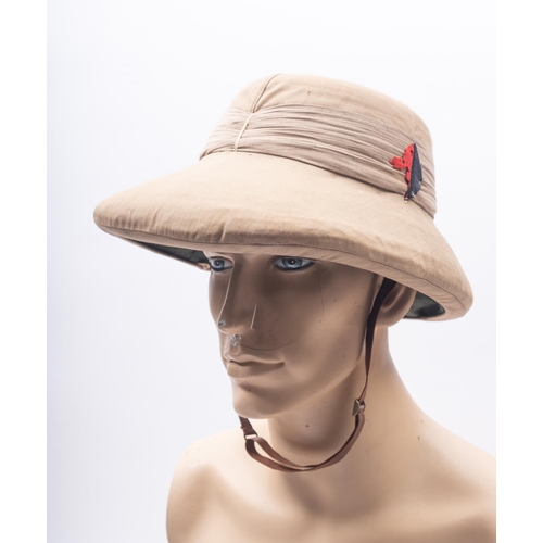 256 - An Australian Commonwealth Forces slouch hat, together with a post-war 7th Ghurka Regiment  hat and ... 