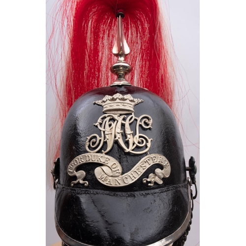 269 - A  1st Duke of Manchester's Cavalry Troopers helmet,  the black leather skull with plated spire and ... 