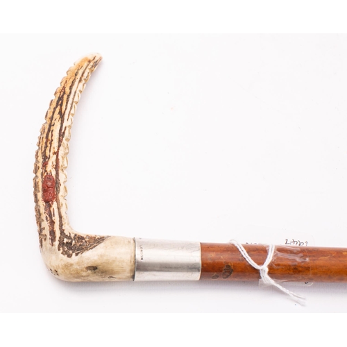 28 - A silver mounted antler handled riding crop, maker Swain & Adeney for Champion & Wilson, London. 194... 