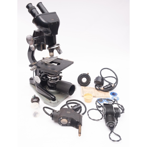 282 - Watson Barnett. A black lacquer Bactil Binocular Microscope, serial number  136218, with War Departm... 