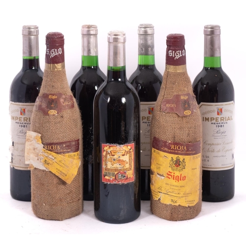 397 - Seven bottles, five Rioja Imperial Cune 1971, two Rioja 1975.