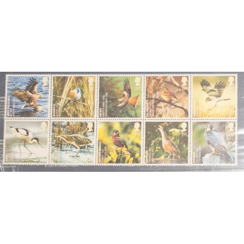 450 - A collection of mainly Great British stamps and covers in two albums with a selection of decimal pre... 