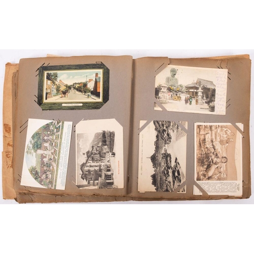 457 - An early 20th century postcard album and contents, GB topographical, including Temple bar, WWI regim... 