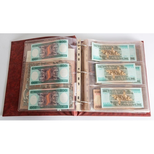 490 - A mixed album of world banknotes, including USA, Russia, Germany , a selection of English Banknotes ... 