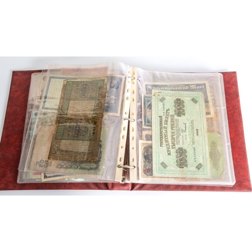 490 - A mixed album of world banknotes, including USA, Russia, Germany , a selection of English Banknotes ... 