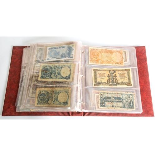 490 - A mixed album of world banknotes, including USA, Russia, Germany , a selection of English Banknotes ... 