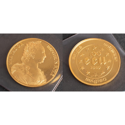 498 - A 'Maria Theresia' 100 ECU Belgian gold coin, dated 1989, diameter ca. 3.7cm, weight (inc plastic ca... 