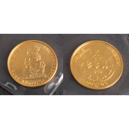 499 - A 'Charlemagne' 50 ECU Belgian gold coin, dated 1989, diameter ca. 2.9cm, weight (inc plastic case) ... 