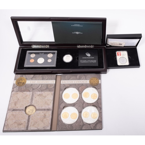 560 - US Mint Moon Landing Proof Coin Set, together with a History of British Coinage Set, and a cased sil... 