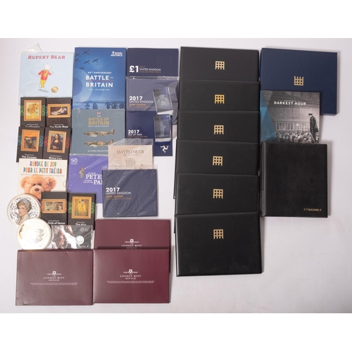 571 - A box containing modern United Kingdom coin sets and Westminster commemorative coin covers, with fam... 