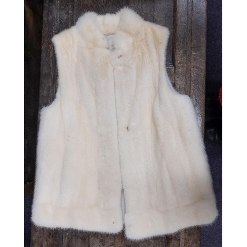 596 - A white Mink fur gillet.