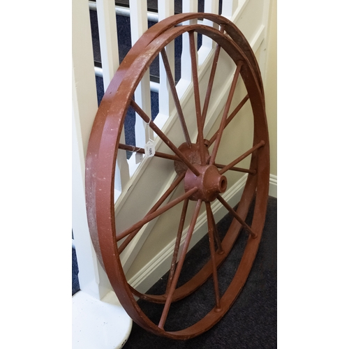 364 - A pair of cast iron cartwheels, of eight spokes, 102cm diameter.