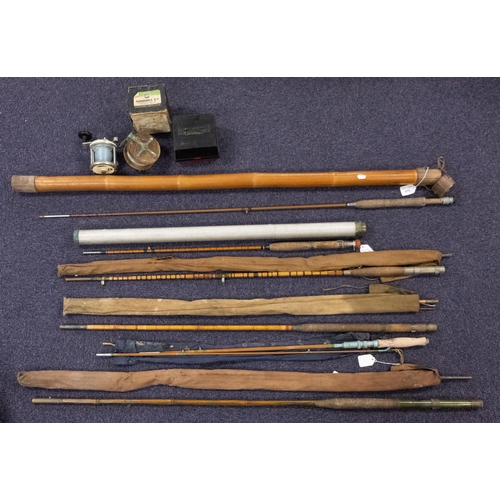 329 - A group of five various split cane fishing rods, one in a bamboo and leather rod case, together with... 