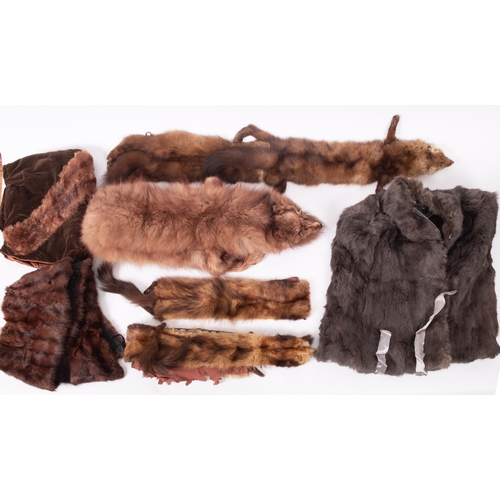 623 - A collection of various furs, comprising a full length fur coat, a fur jacket several fur stoles and... 