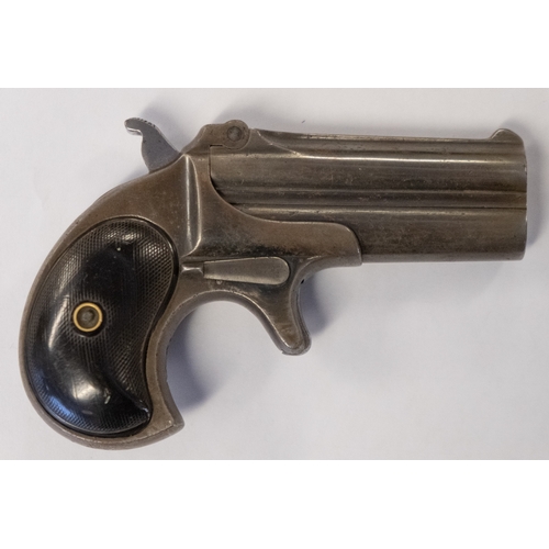 85 - A .41 calibre rimfire Remington Derringer over and under double barrel pistol:, the top flat stamped... 