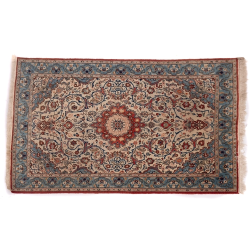 1084 - An Ispahan rug, the ivory cartouche field with central rust cartouche pole medallion, arabesque desi... 