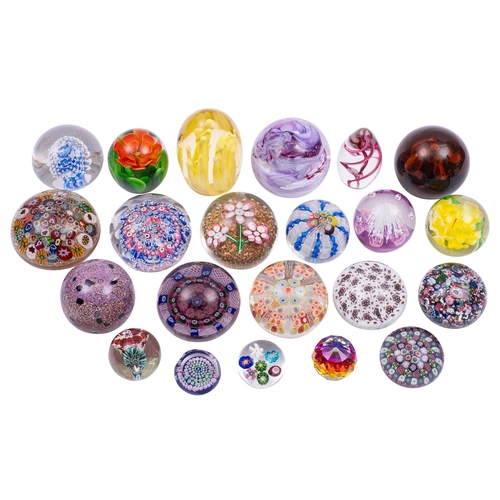 23 - A mixed group of twenty four glass paperweights, including Murano, Scottish, Swarovski, Chinese and ... 