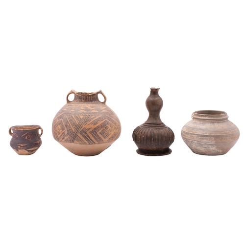 64 - A mixed lot of Chinese pottery, Neolithic and later including two two-handled vessels with geometric... 