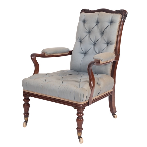 915 - A Victorian rosewood and upholstered library elbow chair, mid 19th century; the show frame with foli... 