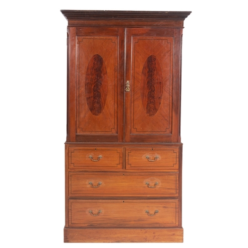 922 - An Edwardian mahogany and line inlaid linen press in George III style, early 20th century; the mould... 