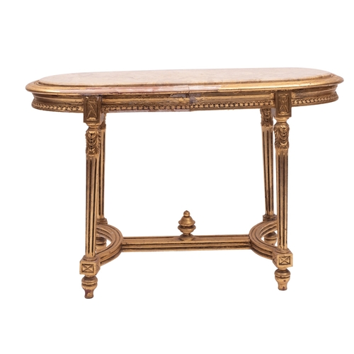 932 - A giltwood and marble topped oval occasional table in Louis XVI style, 20th century; the top with do... 