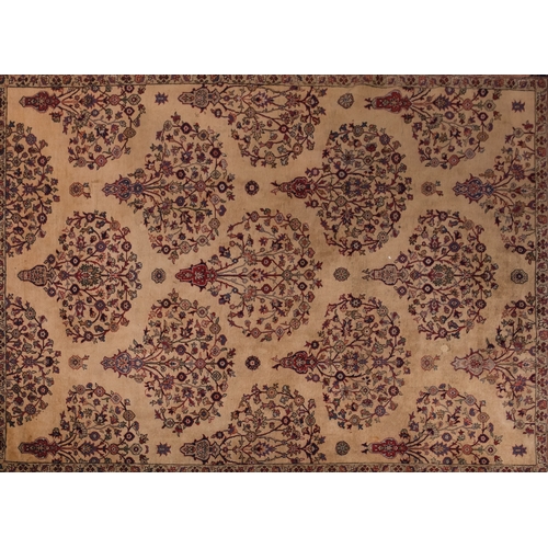 1080 - A Mahal carpet, the beige field with a geometric design of radiating palmettes and scrolling floral ... 