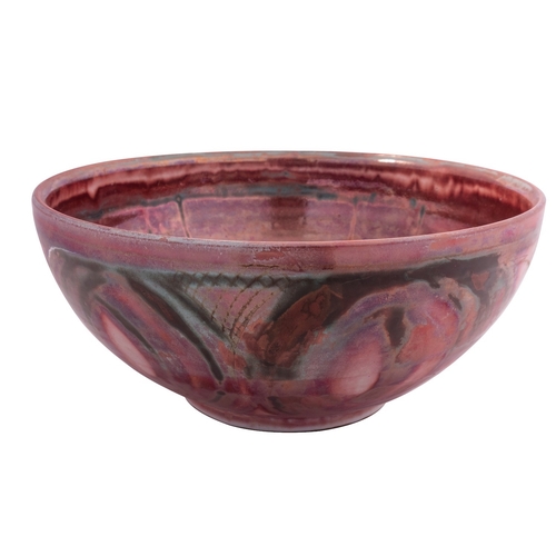 113 - Harry Juniper [Contemporary] an unusual earthenware bowl, the interior and exterior under pink and g... 