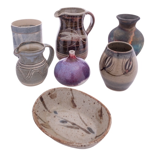 64 - A mixed group of studio pottery, comprising a Pat Armstrong raku fired stoneware vase under copper f... 