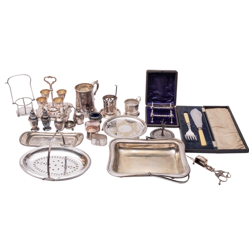 25 - A collection of silver plated items, comprising a quantity of Fiddle pattern flatware, a mug, an egg... 