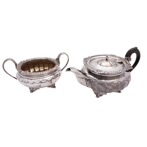 281 - A Victorian silver tea pot by Charles Stuart Harris, London 1886, compressed circular with an ebonis... 