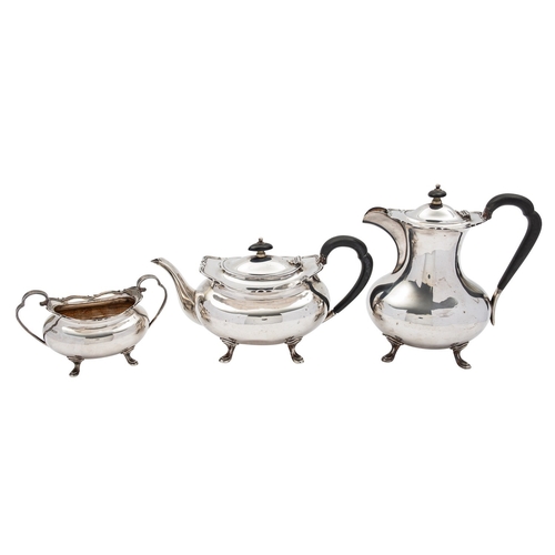 287 - A George V silver three piece tea service by Atkin Brothers, Sheffield 1933, of baluster form, compr... 