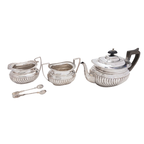 289 - A matched silver three piece tea service, the tea pot by Hawksworth, Eyre & Co. Ltd, London 1903, th... 