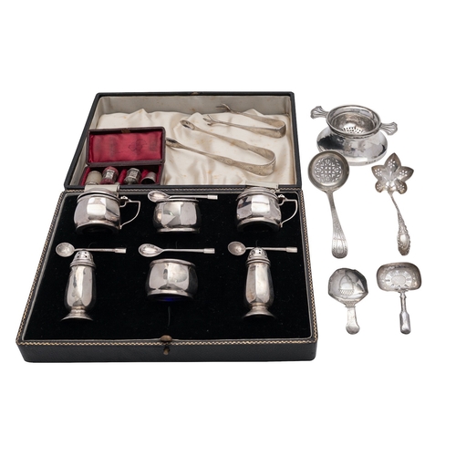 32 - A silver six piece cruet set by Roberts & Dore Ltd, Birmingham 1936, round faceted, in a box with tw... 
