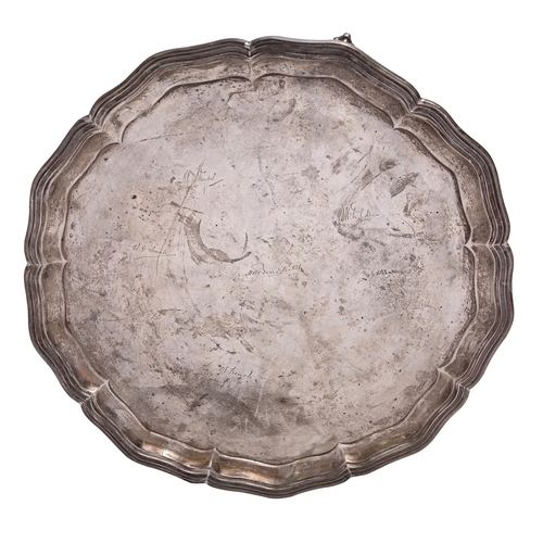 323 - A large silver salver by James Dixon & Sons, Sheffield 1927, shaped circular with a raised moulded r... 