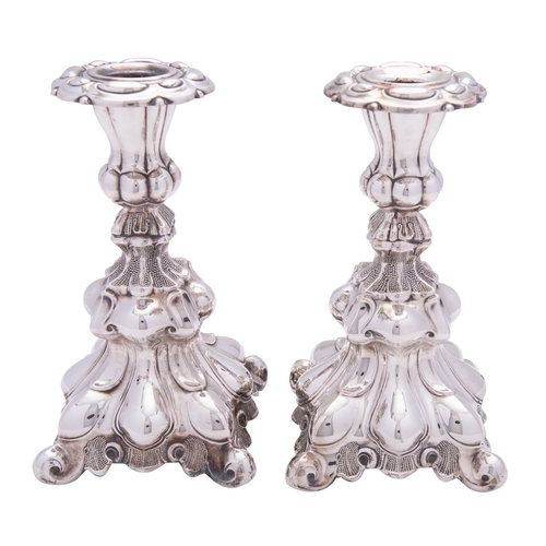 337 - A pair of Danish silver candlesticks by Hans Jensen & Co., Aarhus, national mark for 1959, .833 stan... 