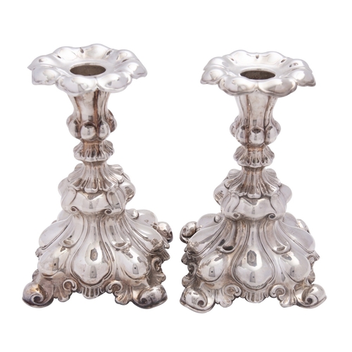 338 - A pair of Swedish silver candlesticks by C. G. Hallberg, Stockholm, date code for 1937, .800 standar... 