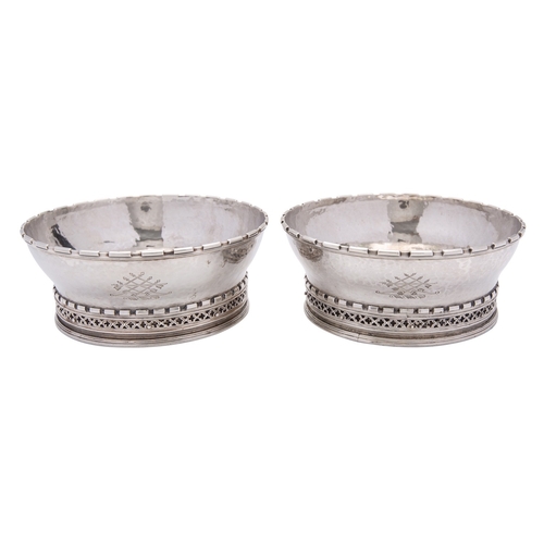 358 - A pair of Arts and Crafts silver wine coasters by Omar Ramsden, London 1933, engraved Omar Ramsden M... 