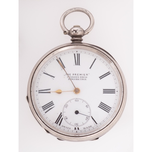 381 - A silver pocket watch the dial having a subsidiary seconds dial and signed for the retailer The Prem... 