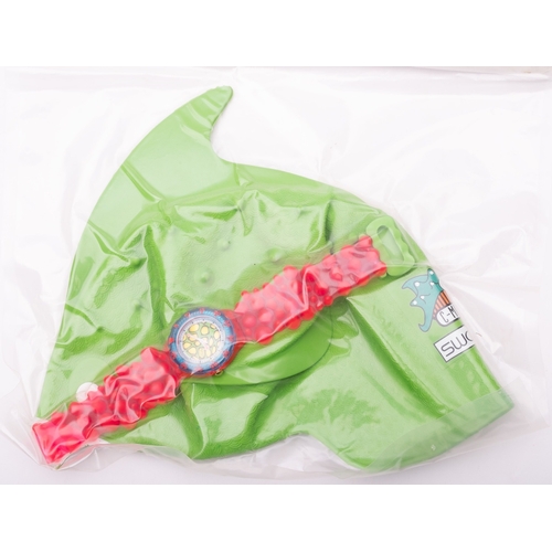 417 - Swatch a blue Looka watch in original box. Swatch a C-Monsta on the Beach red watch with green swimm... 