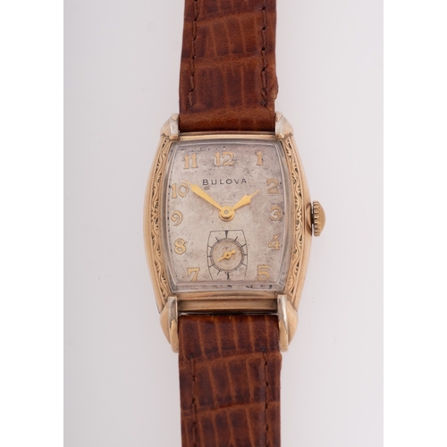 425 - Bulova a gold-plated gentleman's wristwatch the rectangular dial with raised gold Arabic numerals an... 